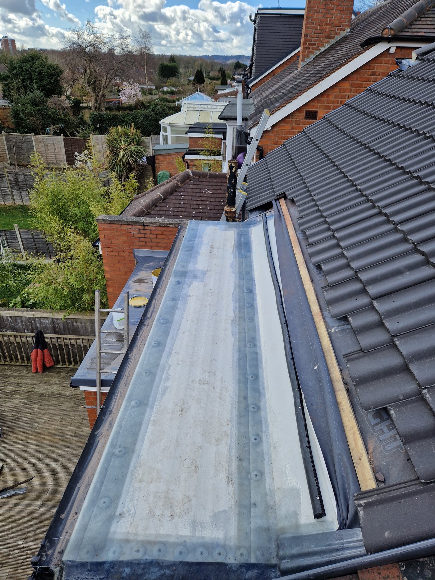 Dryseal resin and reinforced fibre matting applied to panel joints, ready for topcoat