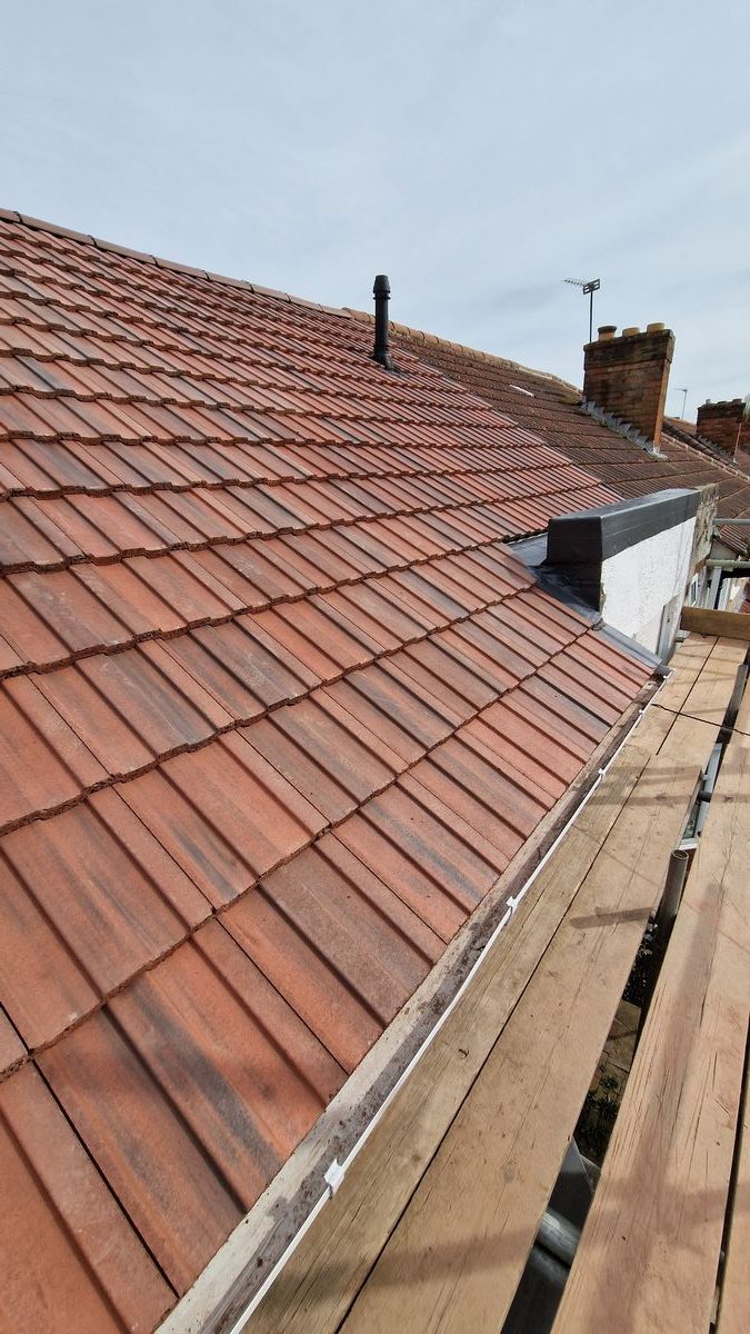 Dark slate re-roof in progress, Birmingham
