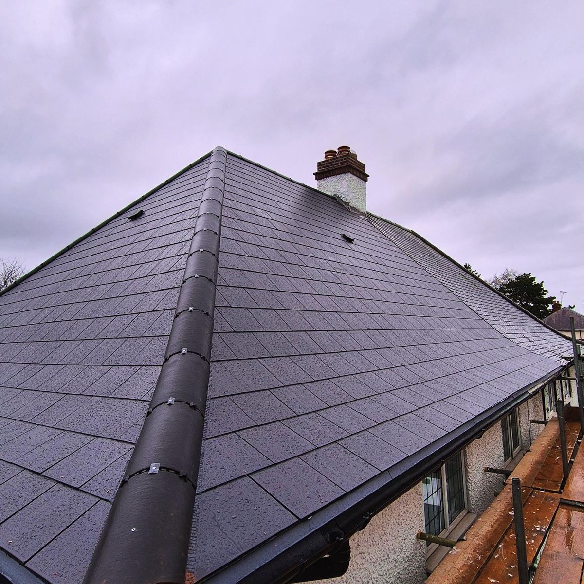 Slate re-roof hip view, large property, Birmingham